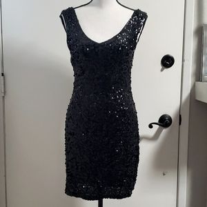 NWT sequin black sexy evening dress size L juniors. Fits a 6-8 ladies.